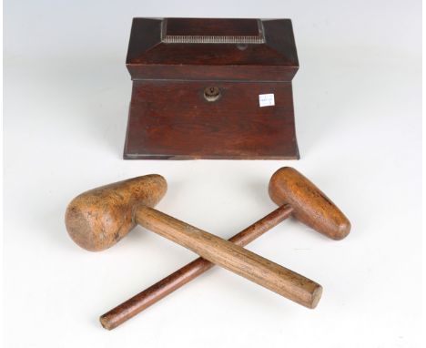 Two 19th century wooden leadworker's mallets, lengths 31cm and 30cm, and a Regency rosewood tea caddy, width 23cm (faults).Bu