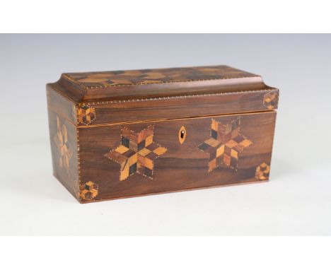 A late Victorian Tunbridge ware tea caddy of sarcophagus form, the hinged lid with parquetry specimen wood inlay, the sides w