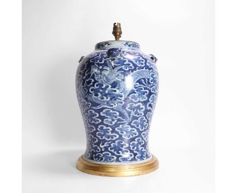 A Chinese blue and white vase, Republic Period (1912-1949), of baluster form with four Buddhist lion handles to the shoulder,