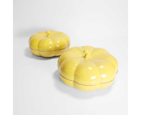 A pair of Chinese yellow-glazed boxes and covers, late Qing dynasty, each in the shape of a pumpkin, the exterior covered wit