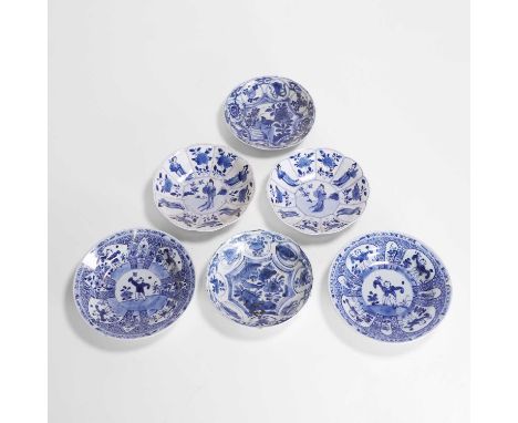 Three pairs of Chinese blue and white dishes, Kangxi (1662-1722), of circular or lobed form, painted with ladies, boys or flo