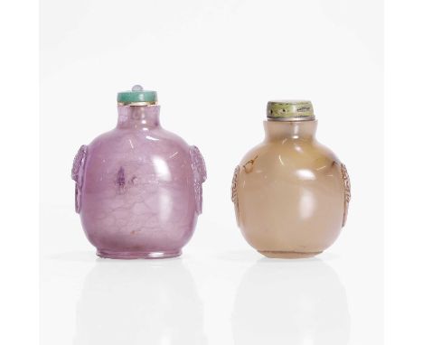 Two Chinese snuff bottles, Qing dynasty (1644-1911), one amethyst and the other agate, both with mask and ring handles to the