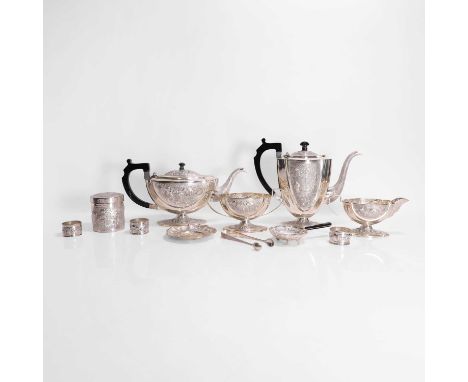An Indian silver tea and coffee service,  mid-20th century, with repoussé decoration of animals and village scenes, marked 's