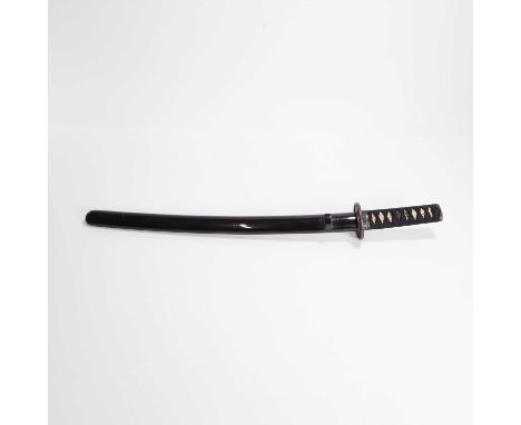 A Japanese wakizashi, Muromachi period (1333-1573), with a black lacquer saya (scabbard), mounted with a white stingray skin 