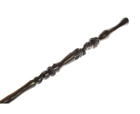 Ebony ethnic carved stick