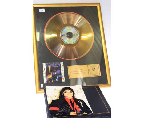Purple Rain limited edition disc award, and Michael Jackson photograph