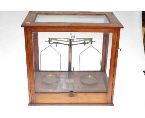 Cased set of brass pharmaceutical scales