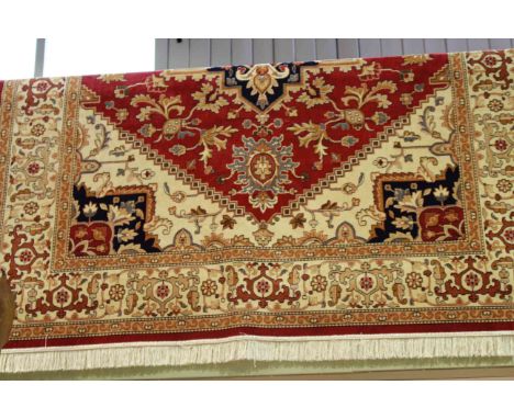 Heriz carpet with a red ground 2.80 x 2.00