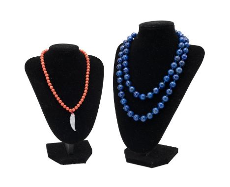 TWO CHINESE NECKLACES  The first of&nbsp;lapis lazuli with 65 beads; the second of coral with 71 beads and a white jade penda