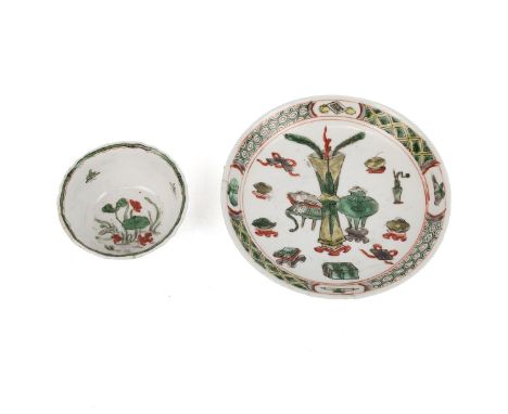 A SET OF CHINESE FAMILLE ROSE TEA CUP AND SAUCER, 18TH CENTURY  With petal rim, the cup decorated with butterflies and birds 