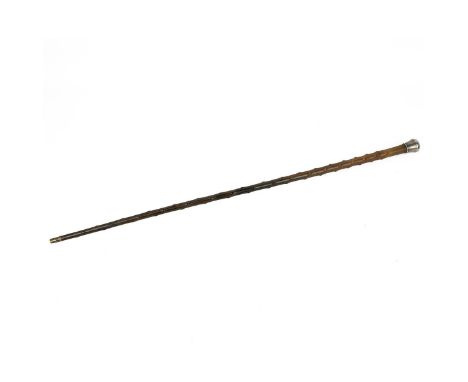 A RHINOCEROS HORN WALKING STICK WITH SILVER POMMEL, 19th CENTURY Engraved initials to the silver head, total length 82.5cm.Pl