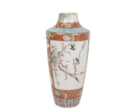 A CHINESE FAMILLE ROSE VASE, REPUBLIC PERIOD (1911-1949)  Of inverted tapering form decorated with a brocade of leaves and fl