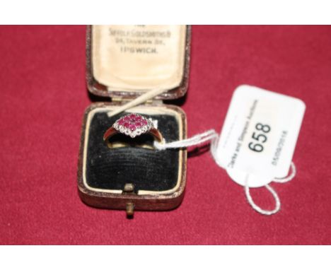 A 9ct gold ruby and diamond set ring