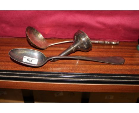 A 19th century silver plated wine funnel; a silver plated serving spoon; and a ladle 