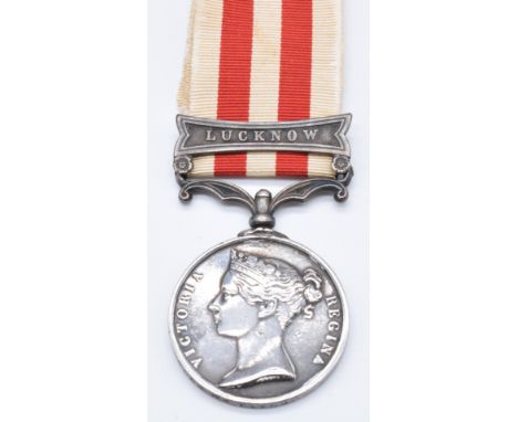 British Army Indian Mutiny Medal 1858 with clasp for Lucknow, named to Bugler William Taylor, 2nd Rifle Brigade