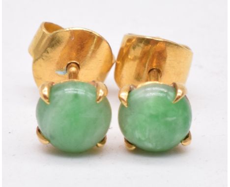 A pair&nbsp;18ct gold earrings set with a jade cabochons