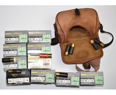 Approximately two-hundred 12 bore shotgun cartridges including Lyalvale Express, most in original boxes together with a leath