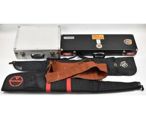 Three various gun slips including Miroku and Beretta examples together with a fitted fur lined gun case and a metal flight ca