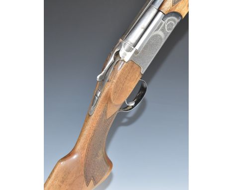 Marocchi 12 bore over and under ejector shotgun with engraved locks, top plate and underside, single trigger, chequered semi-