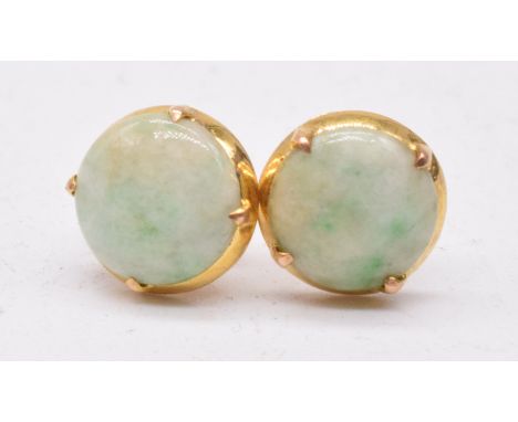 A pair of 18ct gold earrings set with jade cabochons&nbsp;