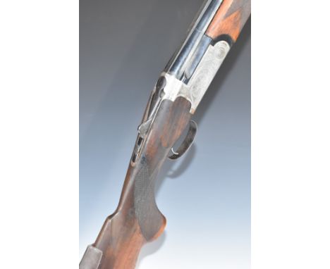 Rottweil 650 12 bore over and under ejector shotgun with engraved locks, underside and fences, chequered semi-pistol grip and