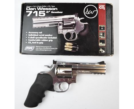 ASG Dan Wesson 715 .177 CO2 4 inch .357 revolver air pistol with textured rubber grip, scope rail and six-shot speed loader, 
