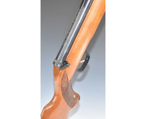 Diana Series 70 Model 79 .22 air rifle with chequered semi-pistol grip, raised cheek piece to the stock and adjustable sights