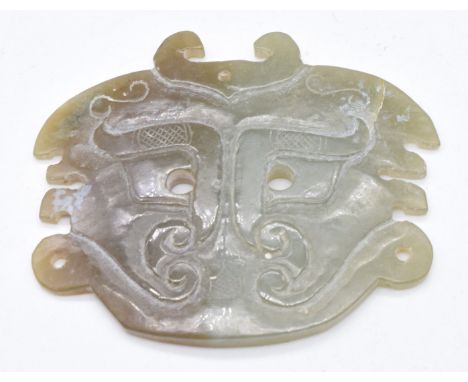 Chinese 19thC archaic jade pendant depicting a stylised Fu dog, 7 x 5.8cm