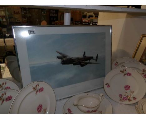 A framed and glazed print entitled 'Dawn over the east coast' by Anthony C Harold