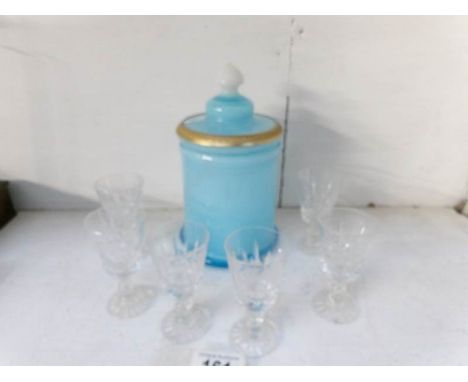 A blue glass cookie jar and a set of 6 glasses