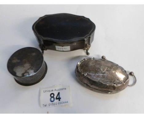 A silver and tortoise shell trinket box, a silver pill box and a silver purse