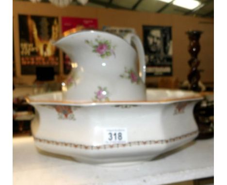 A large wash basin and a jug