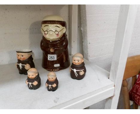 A Monk cookie jar, jug, salt, pepper and mustard pots