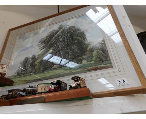 A framed and glazed country scene print
