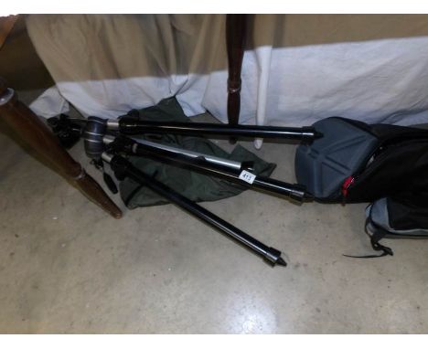 A large Kennett camera tripod