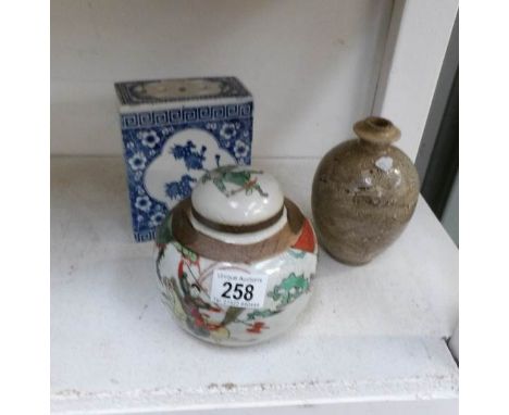 An Oriental blue and white flower brick, a ginger jar and an a/f vase