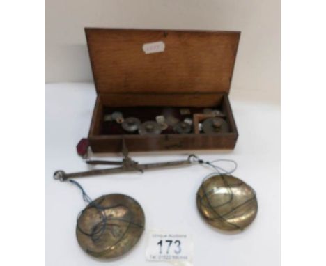 A set of precious metal scales and weights