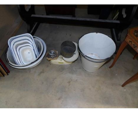 A set of kitchen scales and a quantity of enamel ware
