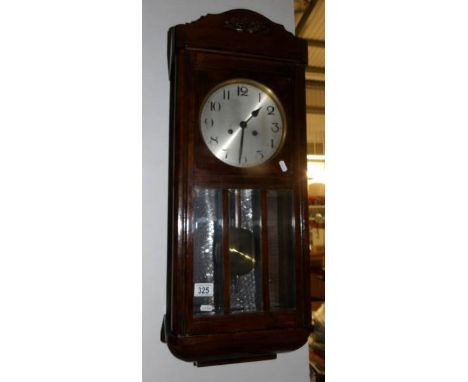 An oak wall clock