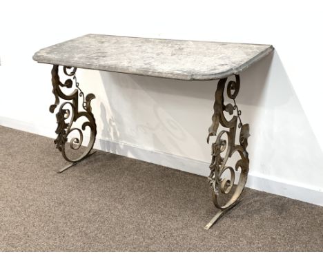 Regency design console table, dent marble top, wrought metal stand with scrolls, mythical birds and traces of gilt, W122cm Co