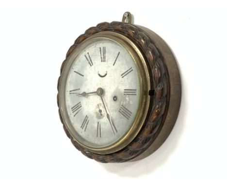 19th century circular wall clock, Roman numeral chapter ring  with subsidiary seconds hand, in oak rope twist frame, (W27cm) 