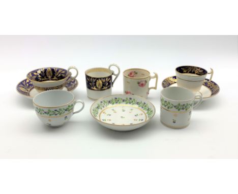 Early 19th Century Derby trio of tea cup, coffee can and saucer with gilt foliage on a dark blue ground, early 19th Century S