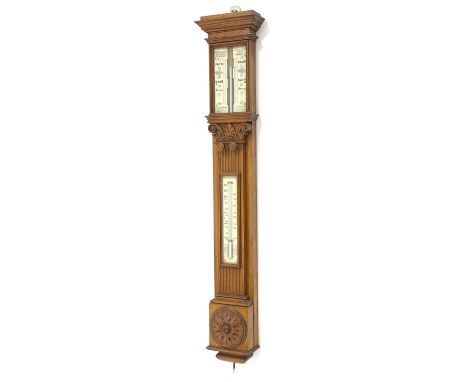 Victorian stick barometer and thermometer, by 'Negretti and Zambra' with ivory registers, in carved oak case, H106cm Conditio