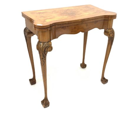 George II design cross banded walnut card table, fold over revolving top revealing baize lined playing surface, shaped apron,