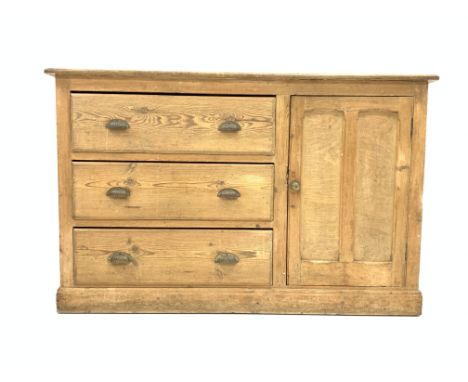 Late 19th century pine sideboard, with three long drawers beside panelled door enclosing one shelf, skirted base, W144cm, H92