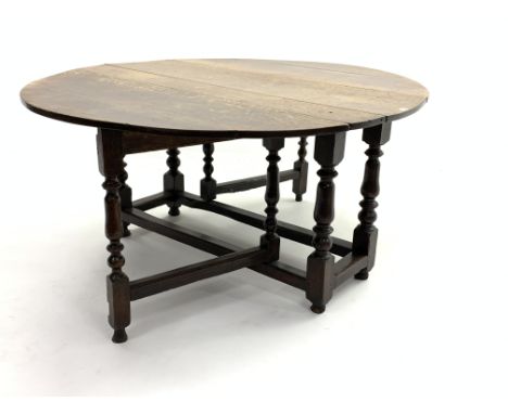 18th century oak drop leaf  gate-leg dining table, oval top raised on turned supports, 164cm x 137cm, H73cm Condition Report 