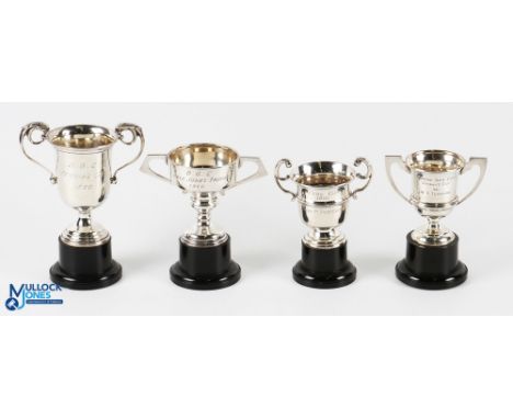 Group of 4 Hallmarked Silver Golf Trophies - all on black plinths, one inscribed B.G.C Veterans Club 1960, hallmarked Birming