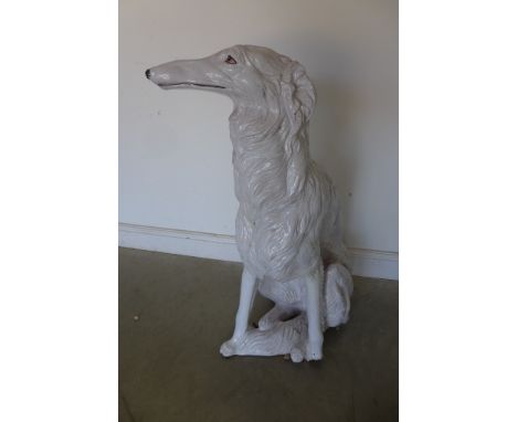 A ceramic figure of a seated Lurcher, 100cm high 