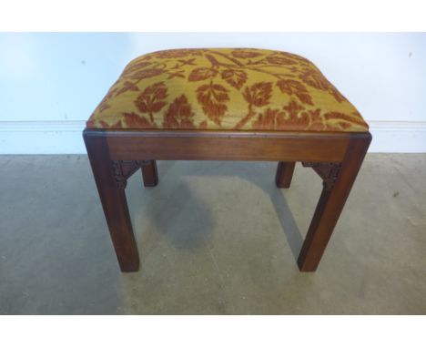 A Chippendale-style padded top stool 