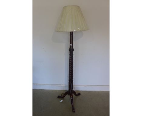 A Georgian mahogany standard lamp with turned and reeded column in restored condition and complete with hand made lined and p